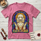 Let Go and Let Dog Poodle T-Shirt flat lay in Heather Heliconia, featuring a stained-glass illustration of a haloed Poodle with paws raised.