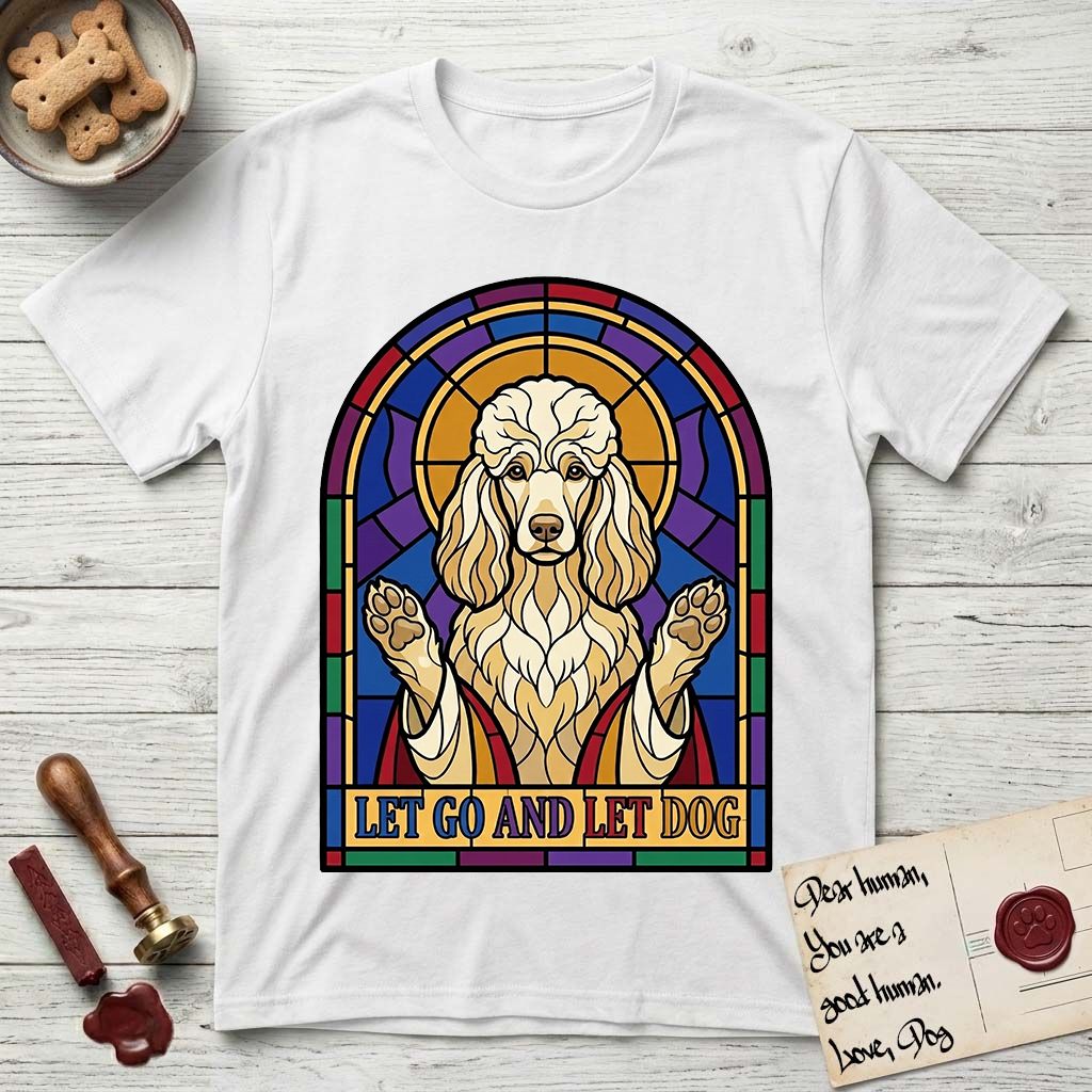 Let Go and Let Dog Poodle T-Shirt flat lay in White, featuring a stained-glass illustration of a haloed Poodle with paws raised.