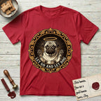 Let Go and Let Dog Pug T-Shirt flat lay in Cherry Red, featuring a baroque medallion engraving of a haloed Pug with paws raised, framed in gold scrollwork.