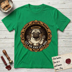 Let Go and Let Dog Pug T-Shirt flat lay in Irish Green, featuring a baroque medallion engraving of a haloed Pug with paws raised, framed in gold scrollwork.