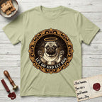 Let Go and Let Dog Pug T-Shirt flat lay in Pistachio, featuring a baroque medallion engraving of a haloed Pug with paws raised, framed in gold scrollwork.