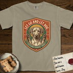 Let Go and Let Dog Rhodesian Ridgeback T-Shirt flat lay in Khaki, featuring a vintage engraved crest of a haloed Rhodesian Ridgeback with front paws raised.