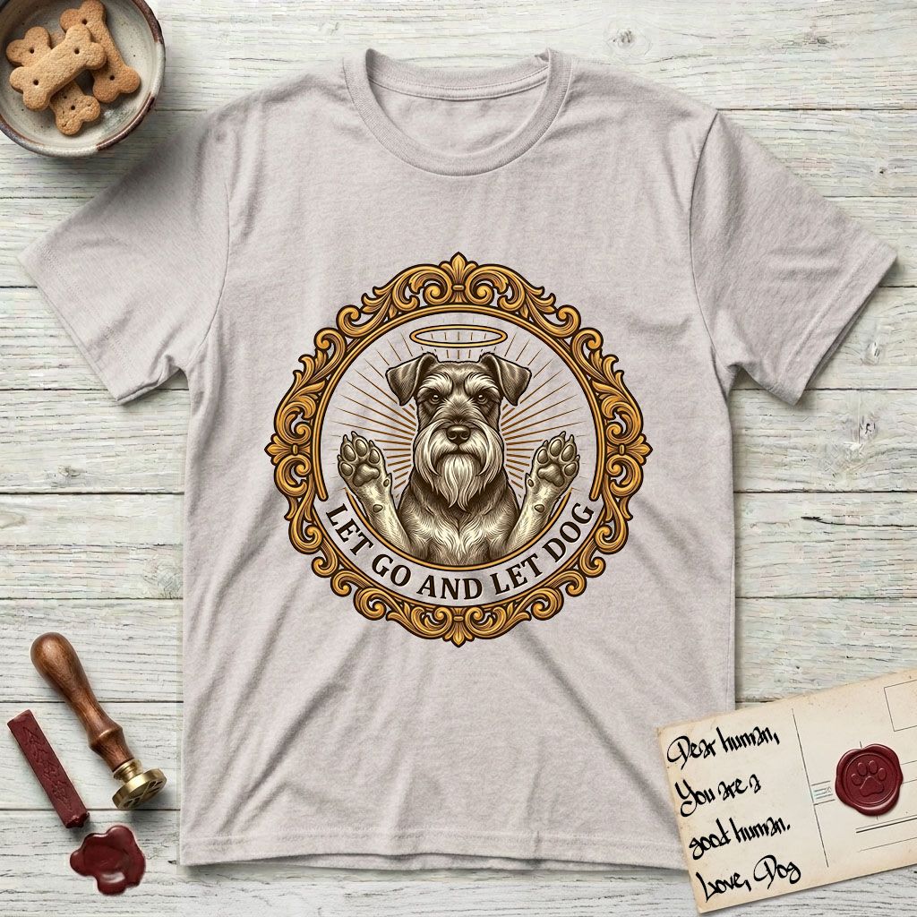 Let Go and Let Dog Schnauzer T-Shirt flat lay in Ice Grey, featuring an ornate gilded medallion of a haloed Schnauzer with front paws raised.