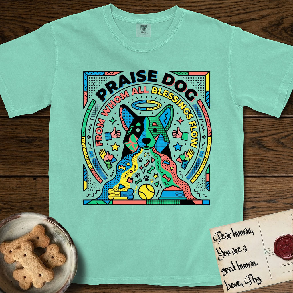 Praise Dog From Whom All Blessings Flow Australian Cattle Dog T-Shirt flat lay in Island Reef, featuring a neon pop-art illustration of an abstract Australian Cattle Dog with bold outlined "Praise Dog From Whom All Blessings Flow" lettering.