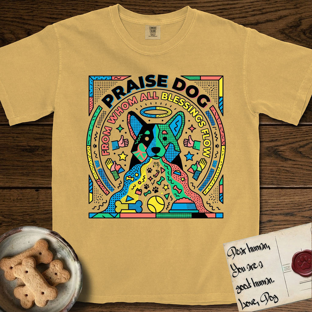 Praise Dog From Whom All Blessings Flow Australian Cattle Dog T-Shirt flat lay in Mustard, featuring a neon pop-art illustration of an abstract Australian Cattle Dog with bold outlined "Praise Dog From Whom All Blessings Flow" lettering.