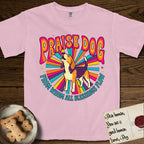 Praise Dog From Whom All Blessings Flow Beagle T-Shirt flat lay in Blossom, featuring a groovy psychedelic sunburst design with a Beagle howling skyward at the center and the words Praise Dog From Whom All Blessings Flow in rainbow bubble letters.