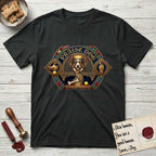 Praise Dog From Whom All Blessings Flow Corgi T-Shirt flat lay in Black, featuring a jeweled baroque throne emblem with a Corgi at center, a golden gemstone frame, raised golden hands in blessing, and the words Praise Dog.