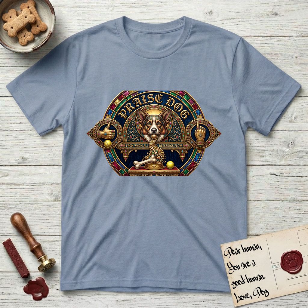 Praise Dog From Whom All Blessings Flow Corgi T-Shirt flat lay in Stone Blue, featuring a jeweled baroque throne emblem with a Corgi at center, a golden gemstone frame, raised golden hands in blessing, and the words Praise Dog.