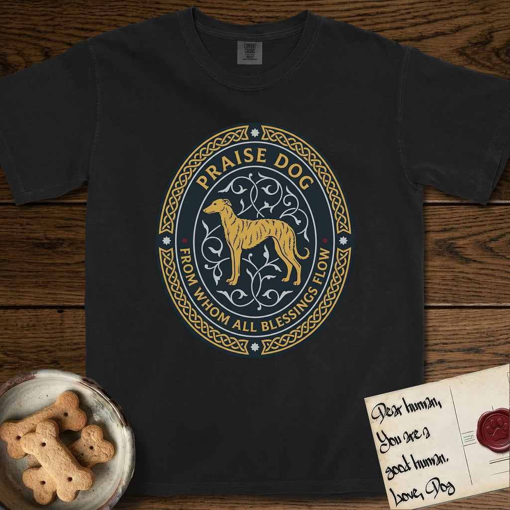 Praise Dog From Whom All Blessings Flow Galgo T-Shirt flat lay in Black, featuring a gold and navy oval medallion with a brindle Galgo standing in profile over silver filigree vines, a knotwork border, and the words Praise Dog From Whom All Blessings Flow.