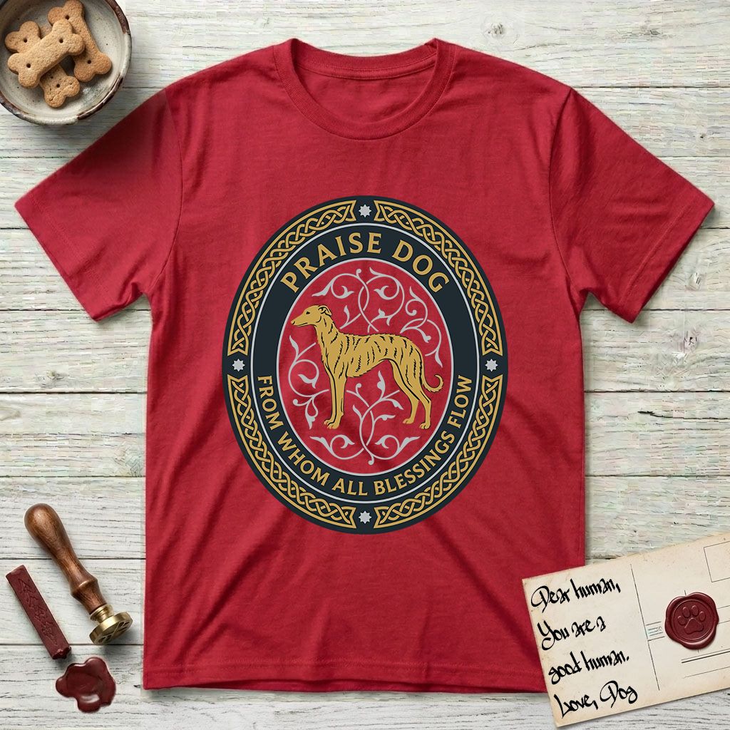Praise Dog From Whom All Blessings Flow Galgo T-Shirt flat lay in Cherry Red, featuring a gold and navy oval medallion with a brindle Galgo standing in profile over silver filigree vines, a knotwork border, and the words Praise Dog From Whom All Blessings Flow.
