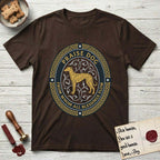 Praise Dog From Whom All Blessings Flow Galgo T-Shirt flat lay in Dark Chocolate, featuring a gold and navy oval medallion with a brindle Galgo standing in profile over silver filigree vines, a knotwork border, and the words Praise Dog From Whom All Blessings Flow.