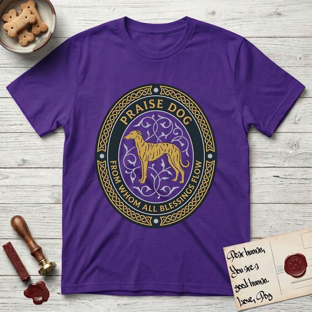 Praise Dog From Whom All Blessings Flow Galgo T-Shirt flat lay in Purple, featuring a gold and navy oval medallion with a brindle Galgo standing in profile over silver filigree vines, a knotwork border, and the words Praise Dog From Whom All Blessings Flow.