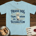 Praise Dog From Whom All Blessings Flow Golden Retriever T-Shirt flat lay in Chambray, featuring a bold Western hand-lettered "Praise Dog" design in navy and gold with a haloed Golden Retriever at center.