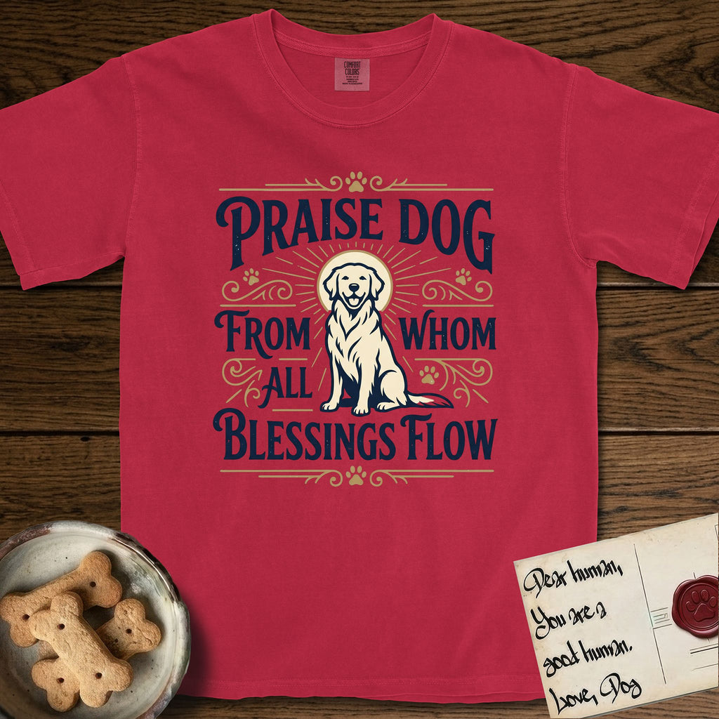 Praise Dog From Whom All Blessings Flow Golden Retriever T-Shirt flat lay in Red, featuring a bold Western hand-lettered "Praise Dog" design in navy and gold with a haloed Golden Retriever at center.