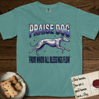 Praise Dog From Whom All Blessings Flow Greyhound T-Shirt flat lay in Blue Spruce, featuring a retro chrome airbrush design with a Greyhound running at full stretch among sparkle stars and the words Praise Dog From Whom All Blessings Flow in chrome sunset lettering.