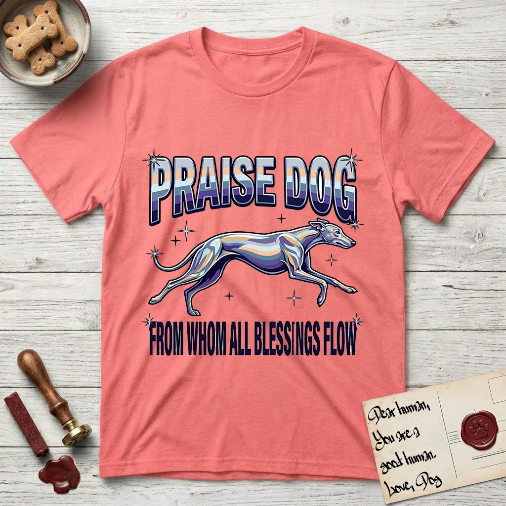 Praise Dog From Whom All Blessings Flow Greyhound T-Shirt flat lay in Coral Silk, featuring a retro chrome airbrush design with a Greyhound running at full stretch among sparkle stars and the words Praise Dog From Whom All Blessings Flow in chrome sunset lettering.