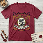 Praise Dog From Whom All Blessings Flow Schnauzer T-Shirt flat lay in Cardinal Red, featuring a vintage tavern sign with a bearded Schnauzer portrait in a gilded oval, hops sprigs, and a ribbon banner, with the words Praise Dog From Whom All Blessings Flow.
