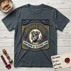Praise Dog From Whom All Blessings Flow Schnauzer T-Shirt flat lay in Dark Heather Grey, featuring a vintage tavern sign with a bearded Schnauzer portrait in a gilded oval, hops sprigs, and a ribbon banner, with the words Praise Dog From Whom All Blessings Flow.