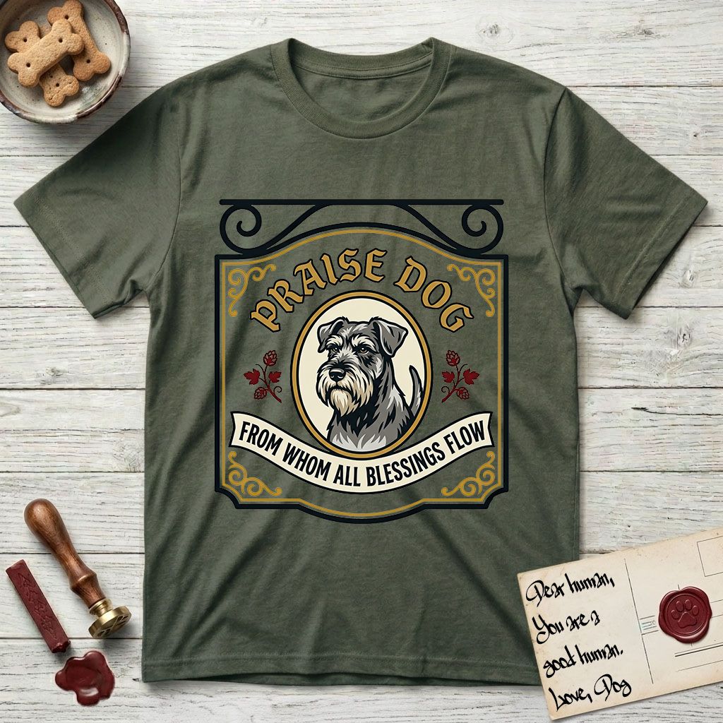 Praise Dog From Whom All Blessings Flow Schnauzer T-Shirt flat lay in Heather Military Green, featuring a vintage tavern sign with a bearded Schnauzer portrait in a gilded oval, hops sprigs, and a ribbon banner, with the words Praise Dog From Whom All Blessings Flow.