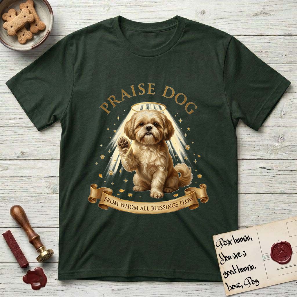 Praise Dog From Whom All Blessings Flow Shih Tzu T-Shirt flat lay in Forest Green, featuring an old-master devotional oil painting of a Shih Tzu seated with one paw raised in blessing, a floating gold halo and streaming light, a shower of small gold blessings, and gilt "Praise Dog From Whom All Blessings Flow" lettering on a ribbon scroll.