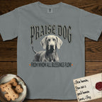 Praise Dog From Whom All Blessings Flow Weimaraner T-Shirt flat lay in Granite, featuring a gothic halftone poster with a Weimaraner staring straight ahead beneath heavy blackletter lettering and the words Praise Dog From Whom All Blessings Flow.