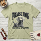 Praise Dog From Whom All Blessings Flow Weimaraner T-Shirt flat lay in Pistachio, featuring a gothic halftone poster with a Weimaraner staring straight ahead beneath heavy blackletter lettering and the words Praise Dog From Whom All Blessings Flow.