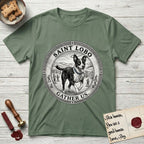 Patron Saint Medallion Saint Lobo T-Shirt flat lay in Military Green, featuring a vintage engraving coin medallion of haloed Saint Lobo running across open ground, with the petition GATHER US.