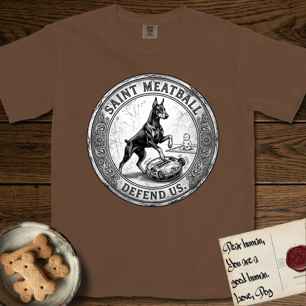 Patron Saint Medallion Saint Meatball T-Shirt flat lay in Espresso, featuring a vintage engraving coin medallion of a haloed Doberman rising on his hind legs, with the petition DEFEND US.