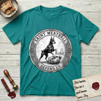Patron Saint Medallion Saint Meatball T-Shirt flat lay in Jade Dome, featuring a vintage engraving coin medallion of a haloed Doberman rising on his hind legs, with the petition DEFEND US.