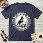 Patron Saint Medallion Saint Meatball T-Shirt flat lay in Navy, featuring a vintage engraving coin medallion of a haloed Doberman rising on his hind legs, with the petition DEFEND US.