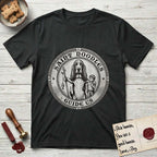 Patron Saint Medallion Saint Noodles T-Shirt flat lay in Black, featuring a vintage engraving coin medallion of a haloed Basset Hound with a staff and a child at her side, with the petition GUIDE US.