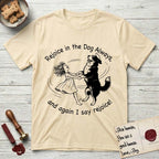 Rejoice in the Dog Bernese Mountain Dog T-Shirt flat lay in Natural, featuring a sparse pen-and-ink illustration of a girl and her Bernese Mountain Dog spinning together, her feet lifting off the ground.