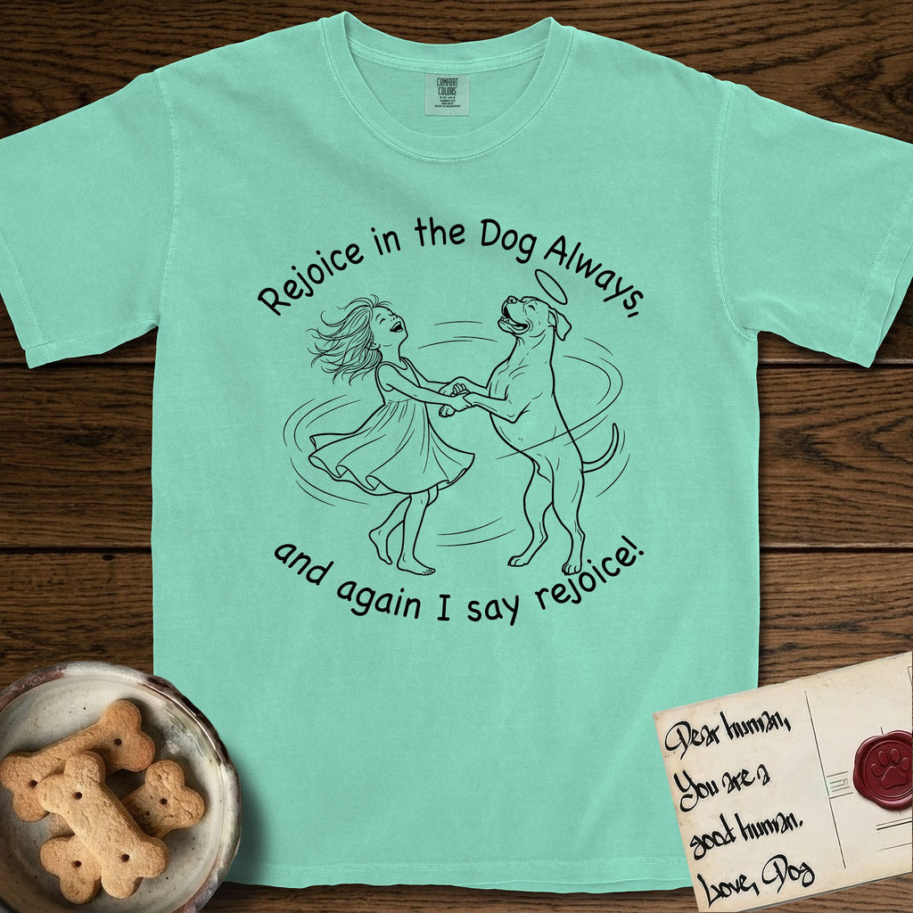 Rejoice in the Dog Boxer T-Shirt flat lay in Island Reef, featuring a sparse pen-and-ink illustration of a girl and her Boxer dancing on his hind legs, both heads thrown back in joy.