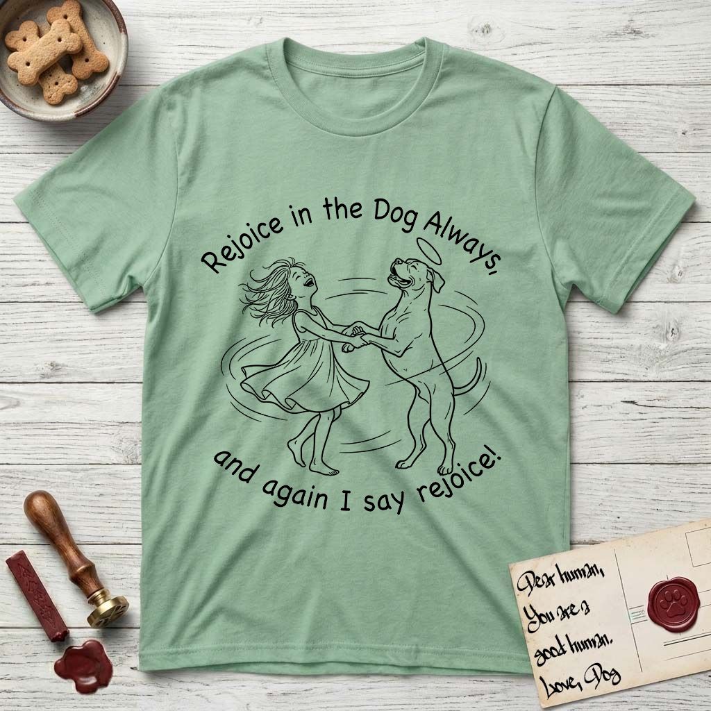 Rejoice in the Dog Boxer T-Shirt flat lay in Mint Green, featuring a sparse pen-and-ink illustration of a girl and her Boxer dancing on his hind legs, both heads thrown back in joy.