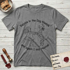 Rejoice in the Dog Dalmatian T-Shirt flat lay in Graphite Heather, featuring a sparse pen-and-ink illustration of a girl and her Dalmatian spinning together, both heads thrown back in joy.
