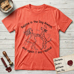 Rejoice in the Dog Dalmatian T-Shirt flat lay in Heather Orange, featuring a sparse pen-and-ink illustration of a girl and her Dalmatian spinning together, both heads thrown back in joy.