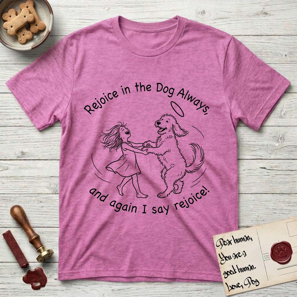 Rejoice in the Dog Goldendoodle T-Shirt flat lay in Heather Berry, featuring a sparse pen-and-ink illustration of a girl and her Goldendoodle dancing together, fur flying, both heads thrown back.