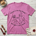 Rejoice in the Dog Goldendoodle T-Shirt flat lay in Heather Berry, featuring a sparse pen-and-ink illustration of a girl and her Goldendoodle dancing together, fur flying, both heads thrown back.