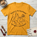 Rejoice in the Dog Samoyed T-Shirt flat lay in Gold, featuring a sparse pen-and-ink illustration of a girl and her smiling Samoyed spinning together, hands and paws clasped.