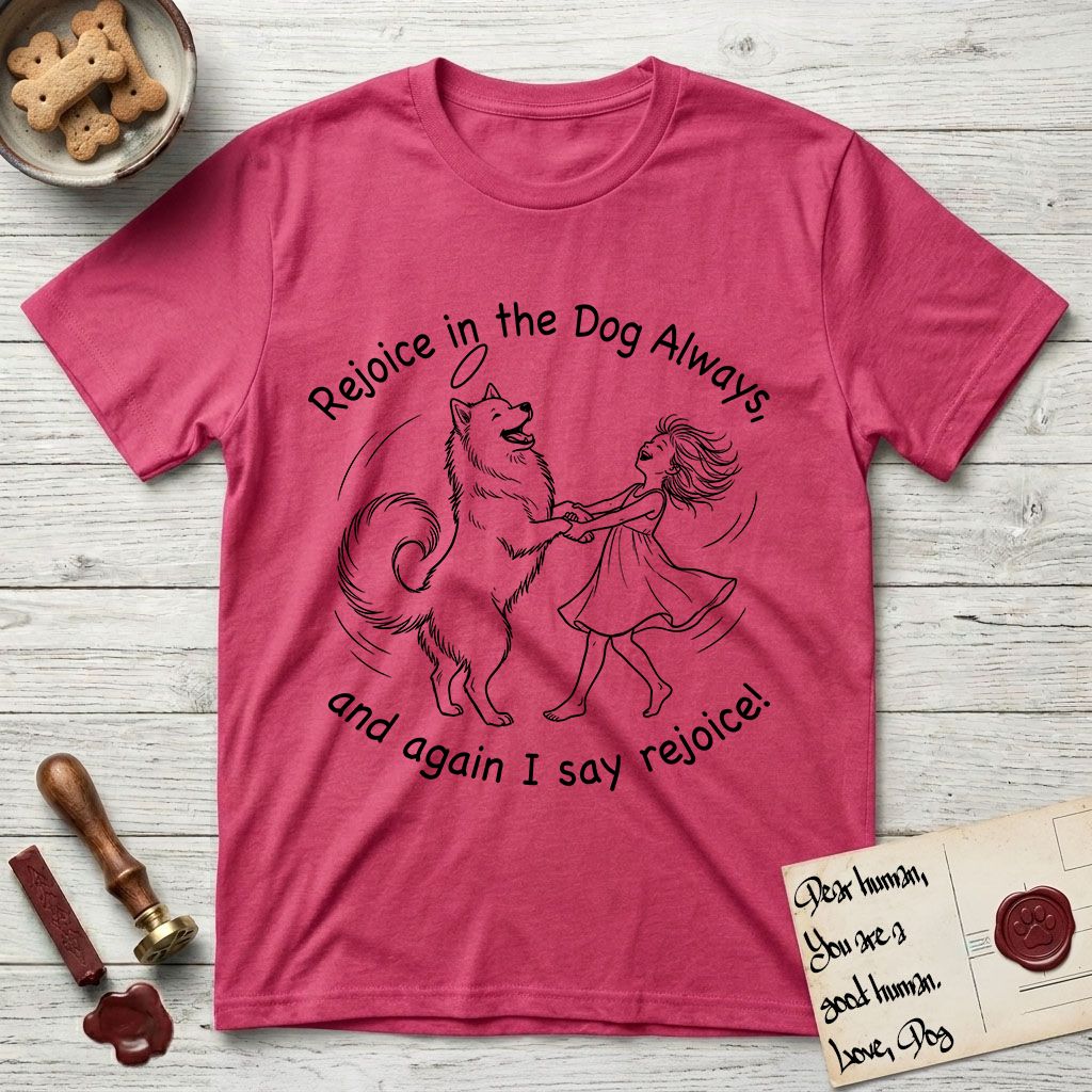 Rejoice in the Dog Samoyed T-Shirt flat lay in Heather Red, featuring a sparse pen-and-ink illustration of a girl and her smiling Samoyed spinning together, hands and paws clasped.