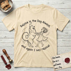 Rejoice in the Dog Samoyed T-Shirt flat lay in Natural, featuring a sparse pen-and-ink illustration of a girl and her smiling Samoyed spinning together, hands and paws clasped.