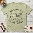 Rejoice in the Dog Samoyed T-Shirt flat lay in Pistachio, featuring a sparse pen-and-ink illustration of a girl and her smiling Samoyed spinning together, hands and paws clasped.