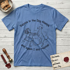 Rejoice in the Dog Whippet T-Shirt flat lay in Carolina Blue, featuring a sparse pen-and-ink illustration of a girl and her Whippet dancing on his hind legs, both heads thrown back in joy.