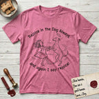 Rejoice in the Dog Whippet T-Shirt flat lay in Heather Heliconia, featuring a sparse pen-and-ink illustration of a girl and her Whippet dancing on his hind legs, both heads thrown back in joy.