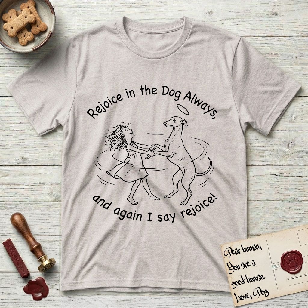 Rejoice in the Dog Whippet T-Shirt flat lay in Ice Grey, featuring a sparse pen-and-ink illustration of a girl and her Whippet dancing on his hind legs, both heads thrown back in joy.