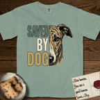 Saved by Dog Galgo T-Shirt flat lay in Bay, featuring half a brindle Galgo's face in distressed vintage screen print, a folded rose ear and a gentle eye, cropped down the centerline beside bold stacked block lettering.
