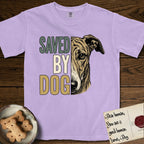 Saved by Dog Galgo T-Shirt flat lay in Orchid, featuring half a brindle Galgo's face in distressed vintage screen print, a folded rose ear and a gentle eye, cropped down the centerline beside bold stacked block lettering.