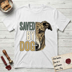 Saved by Dog Galgo T-Shirt flat lay in White, featuring half a brindle Galgo's face in distressed vintage screen print, a folded rose ear and a gentle eye, cropped down the centerline beside bold stacked block lettering.