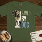 Saved by Dog Jack Russell T-Shirt flat lay in Hemp, featuring half a tan-and-white Jack Russell's face in distressed vintage screen print, a folded ear with a dark patch and forward whiskers, cropped down the centerline beside bold stacked block lettering.