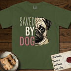Saved by Dog Pug T-Shirt flat lay in Hemp, featuring half a fawn Pug's face in distressed vintage screen print, a dark mask and one large round eye, cropped down the centerline beside bold stacked block lettering.